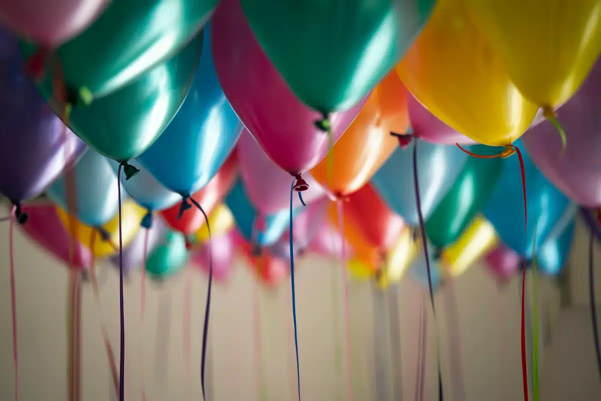 Friends celebrating together at a party with confetti